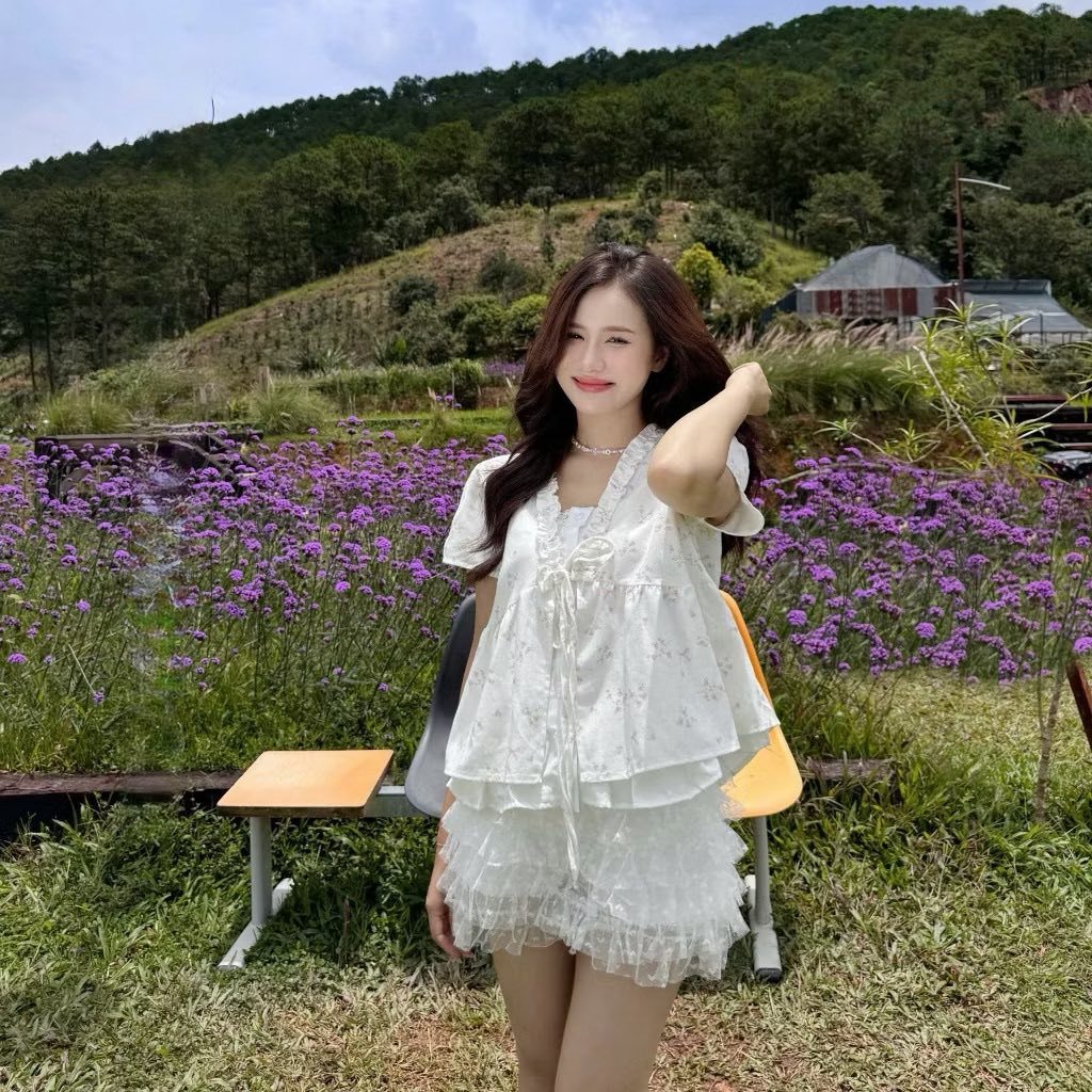 Áo kiểu nữ tay ngắn buộc nơ trước dáng peplum bèo nhún họa tiết nhã nhặn style Hàn Quốc cổ V HCOM27219
