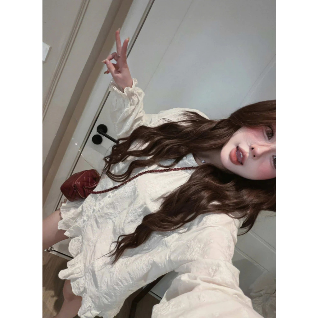 Áo kiểu nữ tay dài dáng babydoll thêu hoa đục lỗ màu trắng tiểu thư giấu quần Hàn Quốc mới HCOM27057