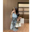 Váy jeans Lvt khóa túi đính đá #sieucappp