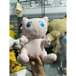 Gấu 2hand thú bông Pokemon Mew màu hồng đáng yêu với đôi mắt xanh to tròn đặc trưng.