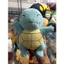 Gấu 2hand gấu bông nhân vật Pokémon Squirtle, nổi bật với biểu cảm gương mặt đang cười nhắm mắt.