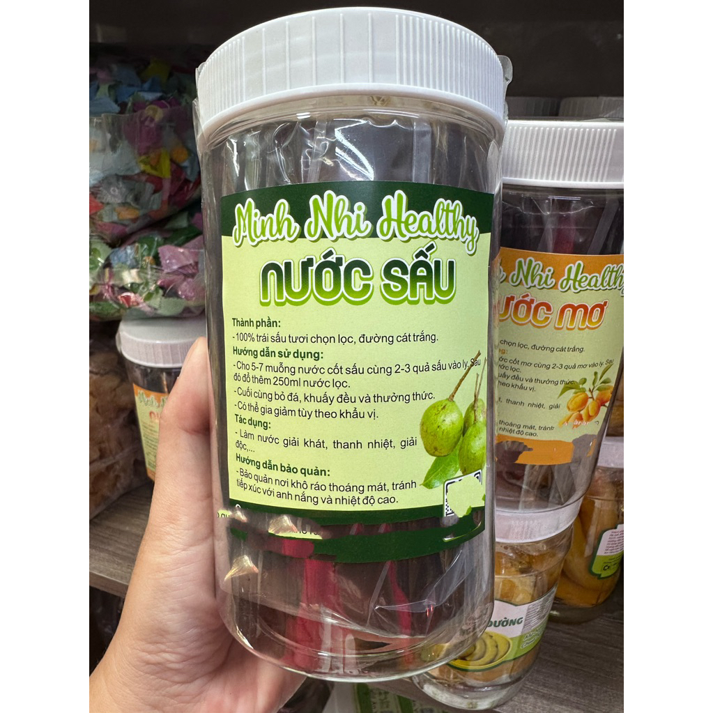 Nước sấu , nước mơ ngâm chua nhiều , nhiều trái .Trái cây sấy Minh Nhi