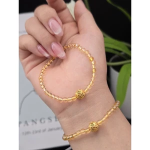 LPT27-Lắc tay thạch anh vàng mix charm cầu