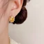 V.I.T Accessories | Bông tai bầu dục đá vàng (1 màu)