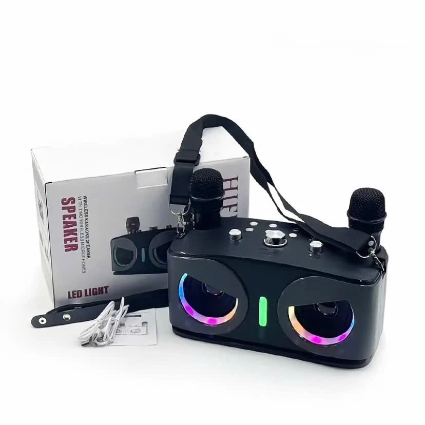 Loa karaoke JK Box WJ-A922 kèm hai micro không dây và hộp sản phẩm trên nền trắng.