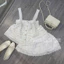 Set bộ ren hoa 2 dây bản to phối cúc dáng babydoll kèm chân váy ngắn xoè viền bèo mặc đi chơi đi biển sang chảnh