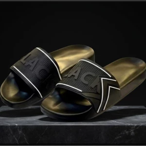 Dép Nam Nữ Quai Ngang Black đen đế sóng chất liệu PU chống trơn trượt