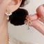 V.I.T Accessories | Bông tai nơ đính đá (2 màu)