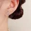 V.I.T Accessories | Bông tai bướm đá tím (1 màu)