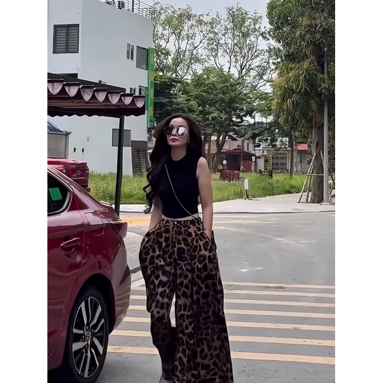 Set Đồ Nữ Da Báo Cá Tính Áo Croptop Đen Kèm Quần Suông Ống Rộng Thời Trang Hàn Quốc New 2026