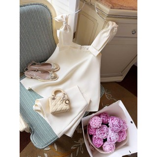 Bộ Đồ Nữ Áo Hai Dây Bản To Thắt Nơ Dáng Babydoll Xòe Màu Trắng Kem Kèm Short Ngắn