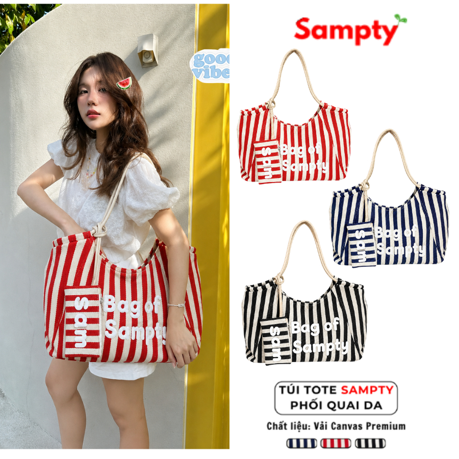 [TẶNG VÍ NHỎ] Túi Tote 𝐒𝐚𝐦𝐩𝐭𝐲 Dáng Tote Mềm In Chữ Sọc Dọc Vải Canvas Phối Quai Da Phong Cách Hàn Quốc 2026