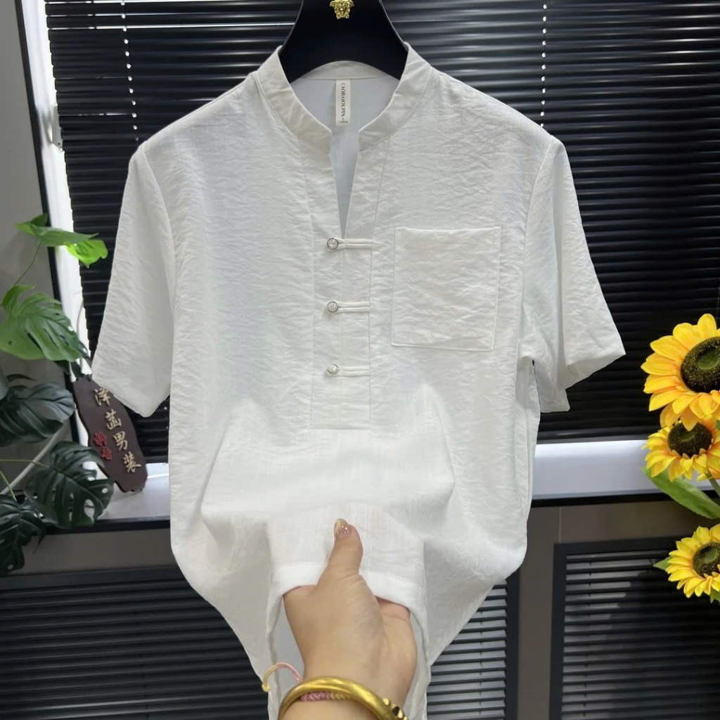 Áo Đũi ngắn tay cổ tàu, chất vải Đũi mềm mịnh thoáng mát, nhẹ nhàng mặc như không mặc.