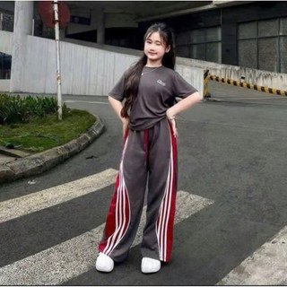 Bộ thun quần xuông chữ BAD cho bé gái 10-44kg)