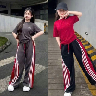 Bộ thun quần xuông chữ BAD cho bé gái 10-44kg)