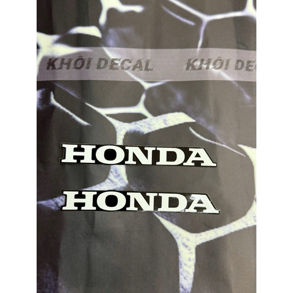 Tem Honda dán bửng trong ,yếm các dòng xe Wave,Future,Airblade…kích thước 1,5*11cm hàng Zin hãng(Giá cặp 2 bên)