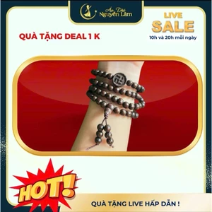 Vòng trầm cao cấp có ấn phật an lành - Áo dài Nguyễn Lâm