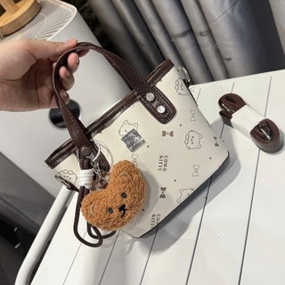 Túi xách nữ mini da PU họa tiết dễ thương, dáng túi hộp nhỏ gọn kèm charm thú bông - TXN156