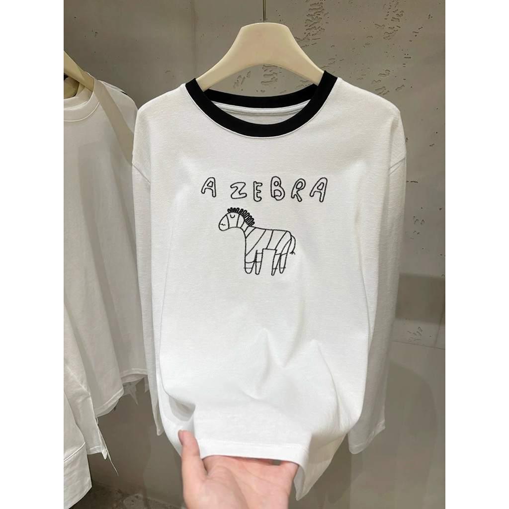 Áo thun nữ tay dài Trắng bo viền nổi bật JULY FASHION, Áo thun dài tay nữ dáng rộng in hình, chất thun xượt mềm mịn