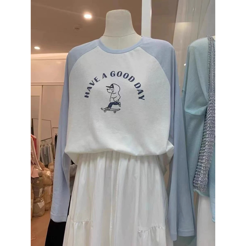 Áo thun nữ dài tay phối màu xanh nhạt in hình JULY FASHION, Áo phông tay dài chất thun xượt, Thu đông 2025