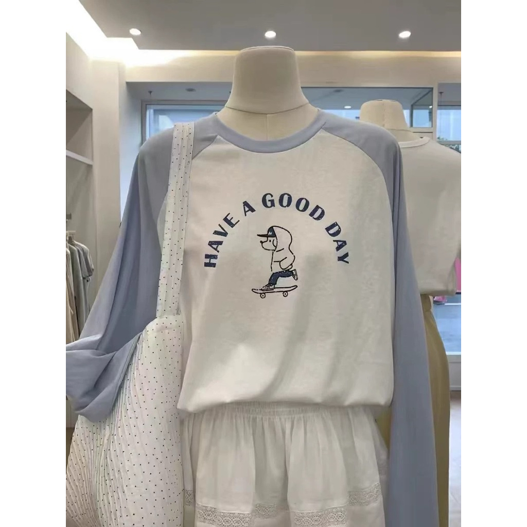 Áo thun nữ dài tay phối màu xanh nhạt in hình JULY FASHION, Áo phông tay dài chất thun xượt, Thu đông 2025