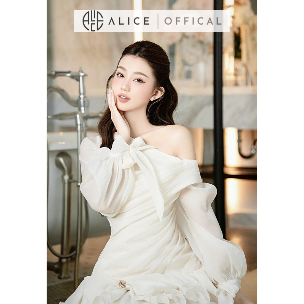 Váy Nữ Dự Tiệc Cao Cấp Alice Chất Tơ Óng Hàn Lót Lụa, Đầm Ngắn Lệch Vai Tay Bồng Dài Buộc Nơ V1403