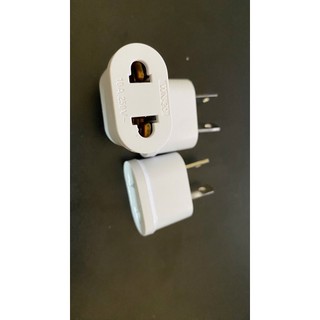 1 phích chuyển sang 2 chân chéo sử dụng ở Úc, Trung Quốc, New Zealand và Mỹ