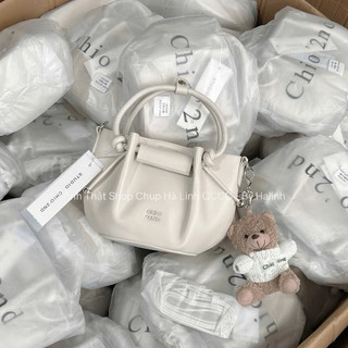 Chio2nd - Tặng Charm - Túi chio làn trắng Nhún miệng siêu xinh tặng kèm gấu cute size 18cm (Ko hộp)