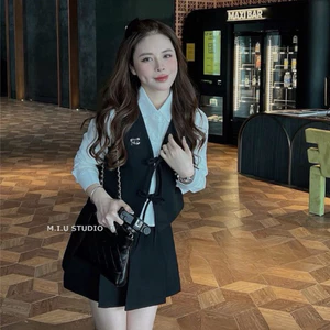 Set 3 món: Áo gile sát nách thiết kế thắt nơ điệu đà kèm áo sơmi cổ đức dài tay phối chân váy xếp ly ngắn xoè sang chảnh