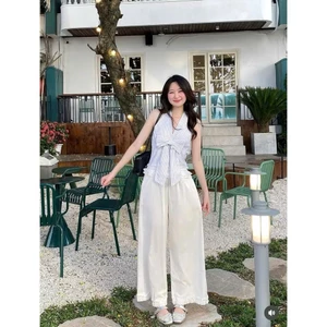 set áo sọc cột yếm hở lưng đính nơ mocking co giãn mix quần đũi ống rộng viền bèo sang chảnh