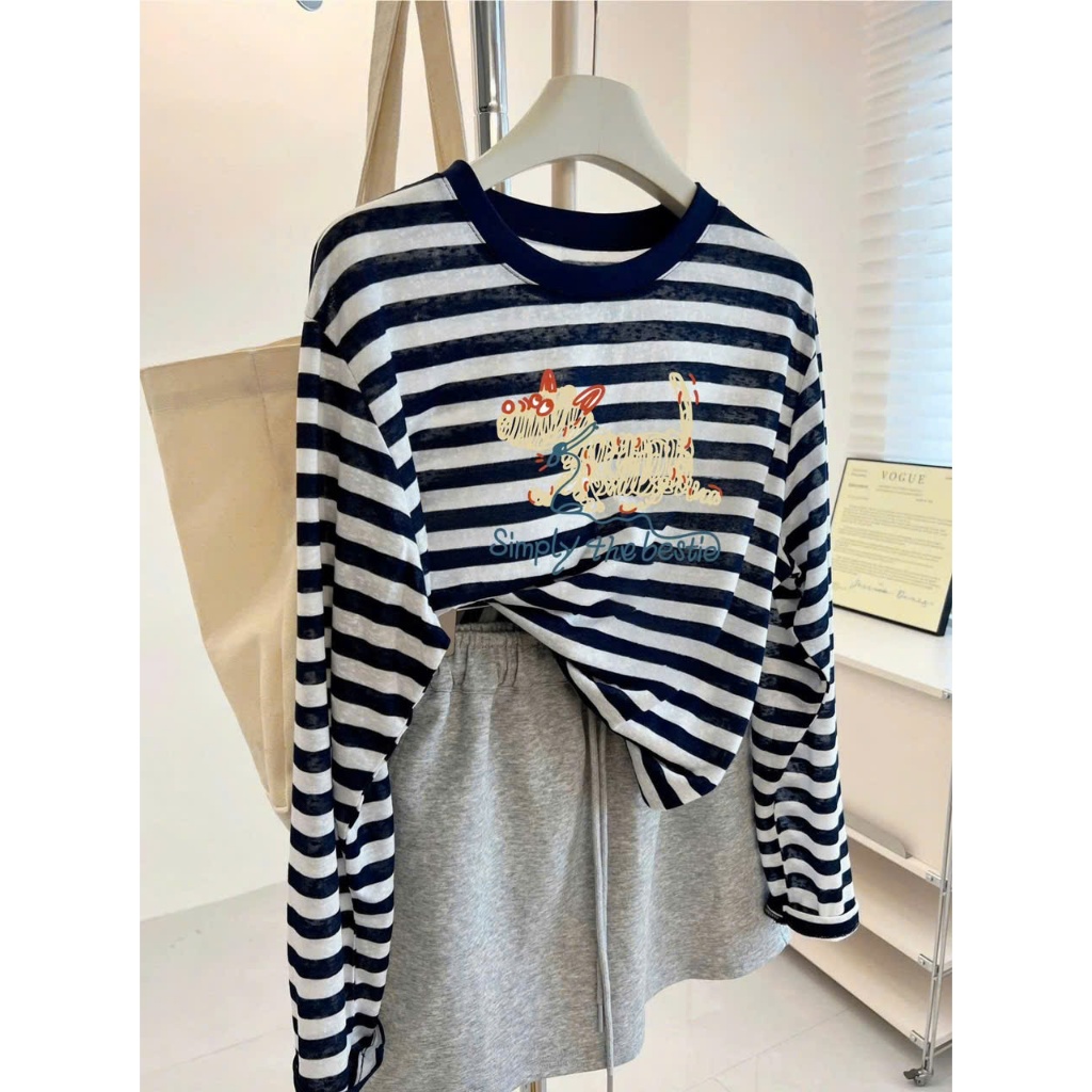 Áo thun tay dài nữ kẻ sọc ngang xanh đậm in hình trẻ trung JULY FASHION, Áo dài tay dáng rộng, mẫu mới mùa Thu Đông 2025