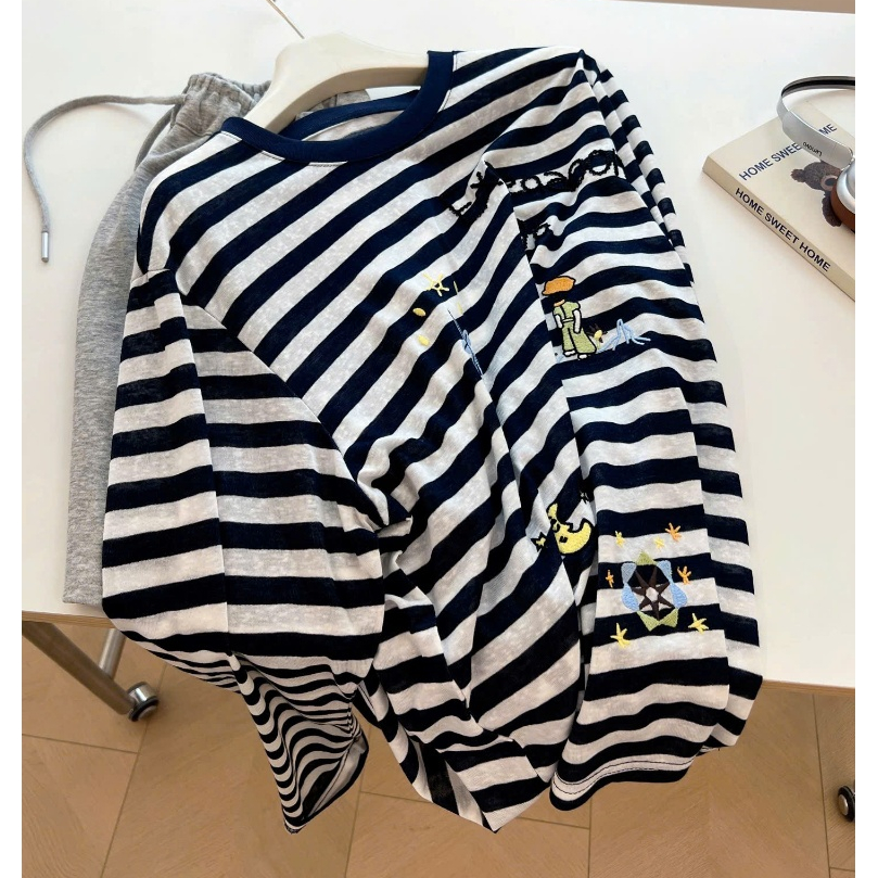 Áo thun tay dài nữ kẻ sọc ngang xanh đậm in hình trẻ trung JULY FASHION, Áo dài tay dáng rộng, mẫu mới mùa Thu Đông 2025