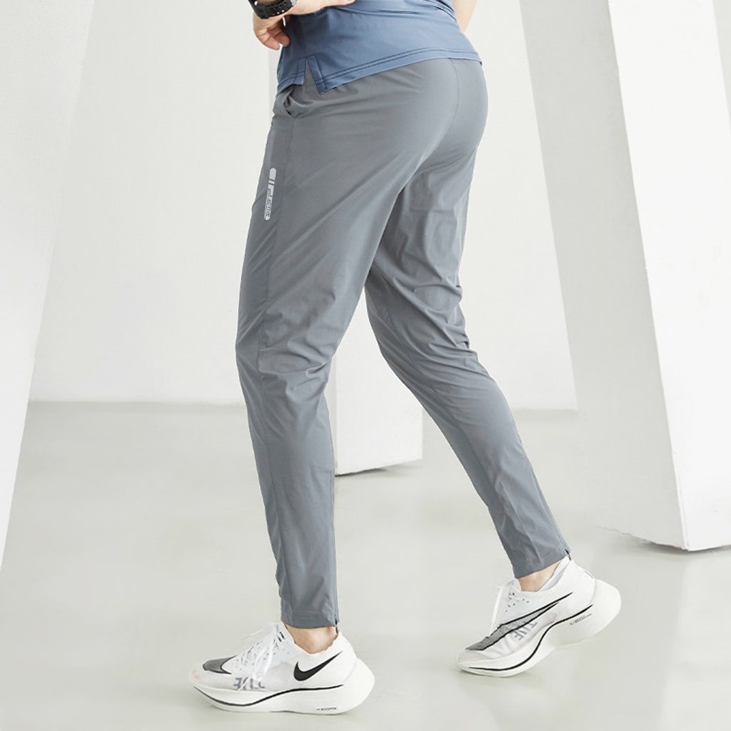 Quần gió dài thể thao nam chất vải gió co giãn thoải mái, kiểu dáng trẻ trung năng động qgd