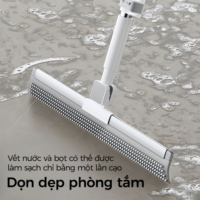 Cây lau nhà ma thuật dùng để cạo và lau sàn phòng tắm, với đầu silicon xoay 180° và các điểm nhô lên để có khả năng làm