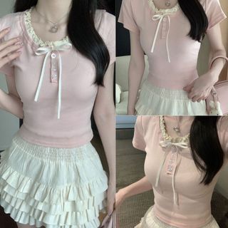 Áo thun nữ cổ tròn bèo nhẹ phối nơ trước ngực dáng ôm màu hồng VANISA CT147