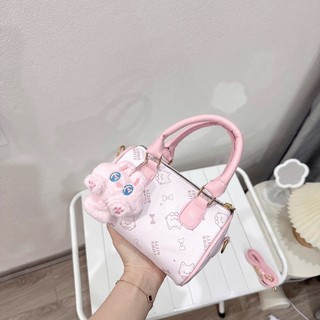 Túi xách nữ mini ,cầm tay họa tiết mèo đáng yêu size 17cm dáng trống kèm charm bông cute - TXN086