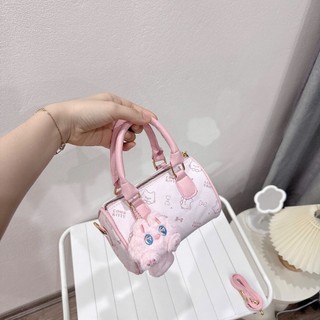 Túi xách nữ mini ,cầm tay họa tiết mèo đáng yêu size 17cm dáng trống kèm charm bông cute - TXN086