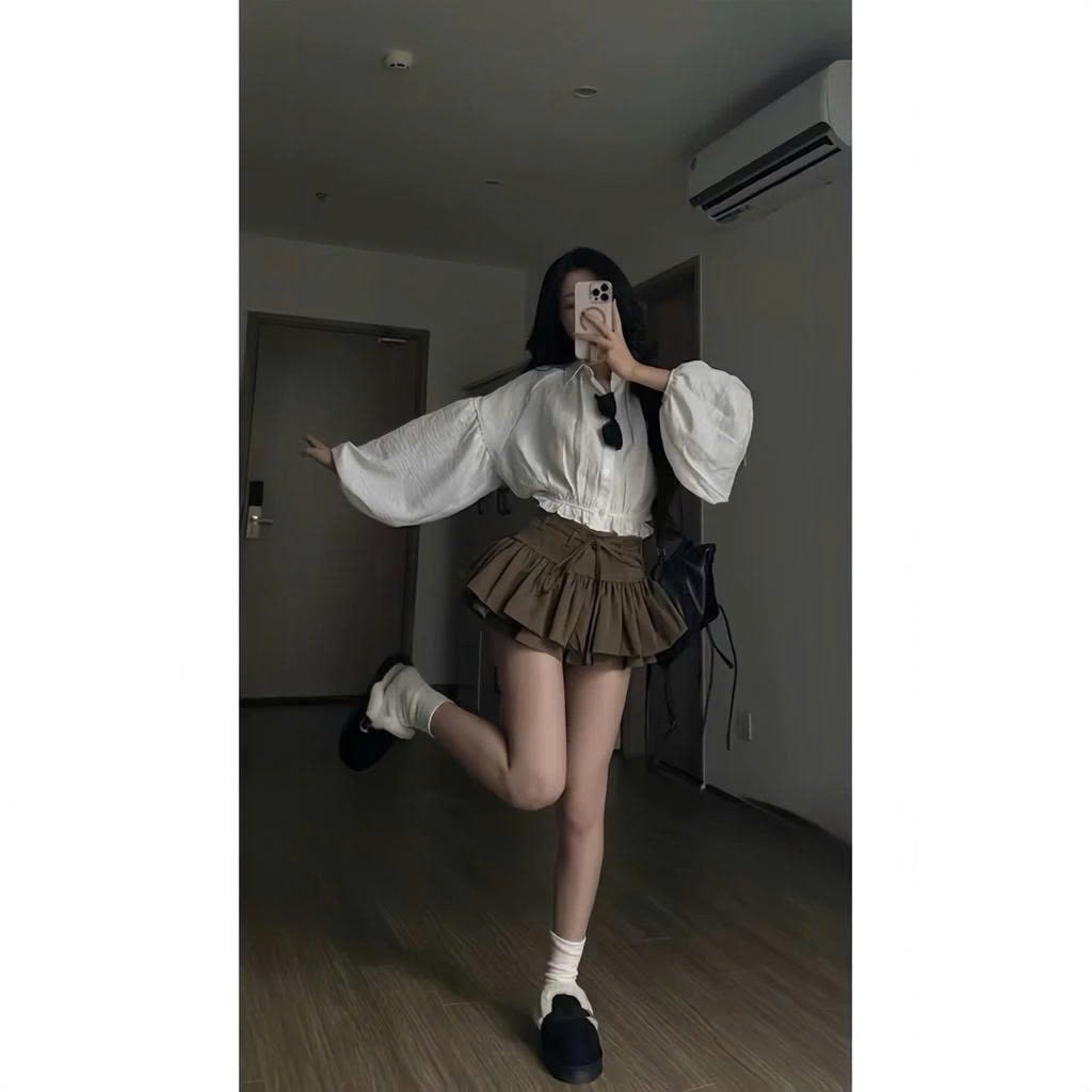 Set Áo Sơ Mi Dáng Croptop Tay Bồng Chun Dưới Kèm Chân Váy Dáng Xoè Tầng Mix Dây Đai Siêu Xinh MS111