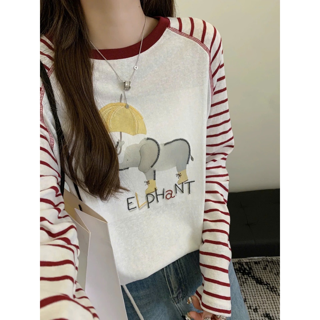 Áo dài tay nữ, Áo phông tay dài phối màu, Tay kẻ sọc ngang in hình JULY FASHION, Áo thun mùa Thu Đông, chất thun xượt