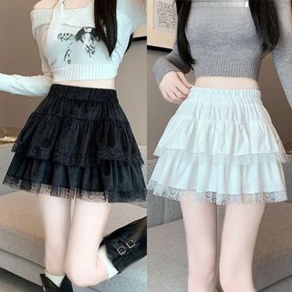Váy ngắn nữ có quần bảo hộ chất voan xoè 3 tầng phối ren xinh đi màu trắng đen VANISA CT467