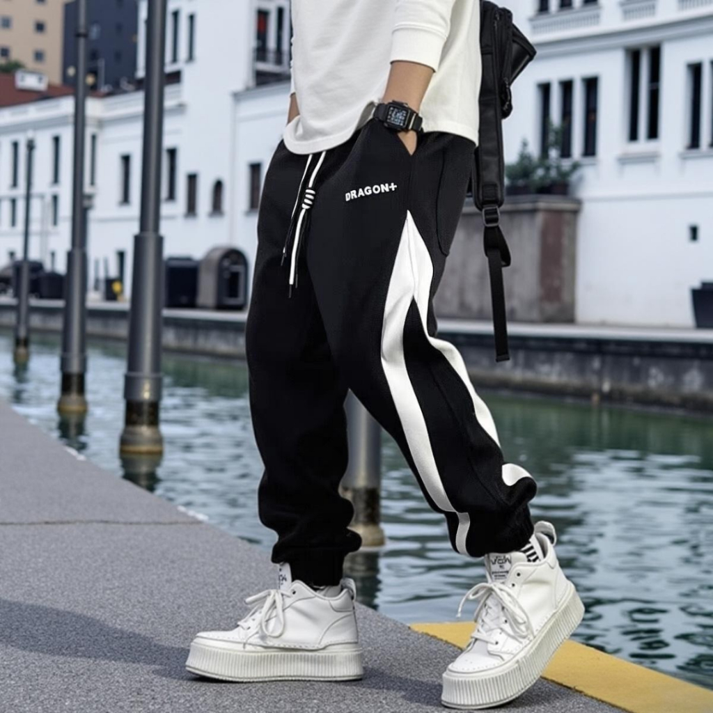 Quần dài thun nỉ phong cách thể thao hình thật size 40 -75kg ( DRAGON phối sọc ) - unisex K1