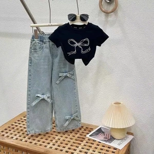 Bộ quần áo 2 Món Quần Bò Đính Nơ và Áo Cotton In Hình Nơ Cho Bé Gái