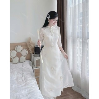 Set áo dài thời trang nữ phong cách trang nhã vải tơ họa tiết thêu tươi tắn phối quần tuyết mưa dài ống rộng