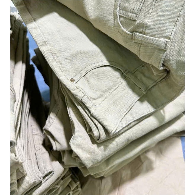 Quần jeans Nữ LƯng Cao ống loe dài màu kem co giãn 4 Chiều