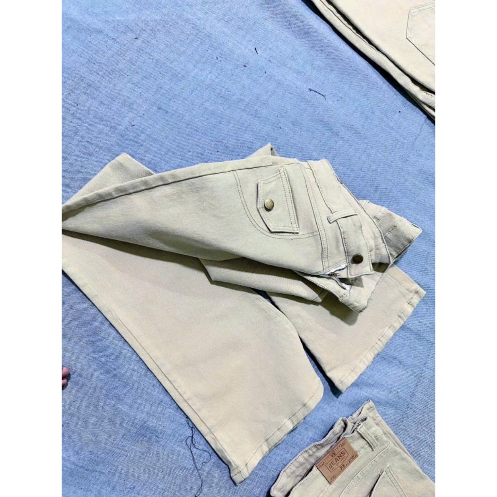 Quần jeans Nữ LƯng Cao ống loe dài màu kem co giãn 4 Chiều