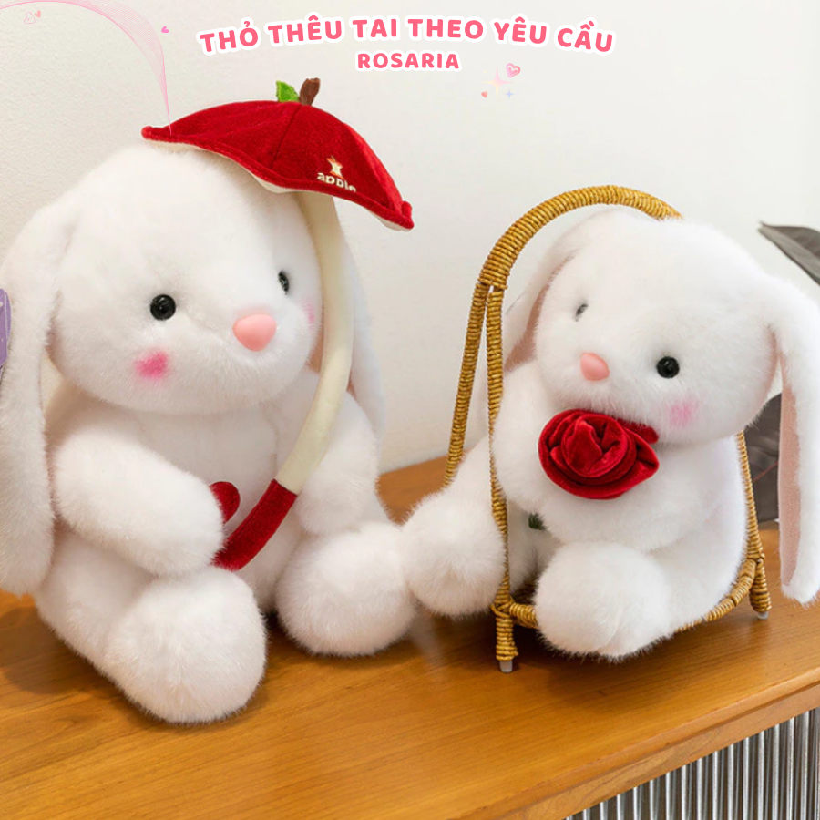 Gấu bông thỏ trắng ôm phụ kiện thêu tai theo yêu cầu. Thỏ bông ôm hoa làm quà tặng đáng yêu Rosaria