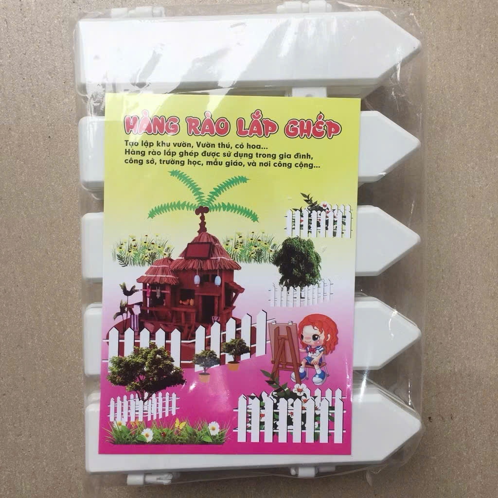 Hàng rào nhựa trắng trang trí cây thông Noel