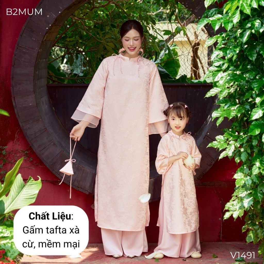 Áo dài họa tiết hoa hồng, tết nơ cổ tàu, chất liệu mềm mại co giãn nhẹ, màu hồng nhạt - V1491 B2MUM