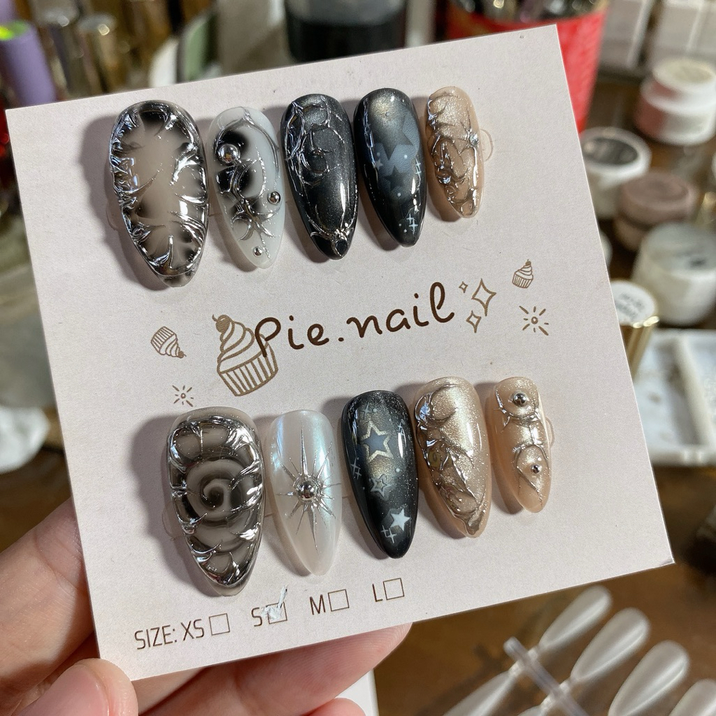 446. nailbox đen mắt mèo mix tráng gương loang