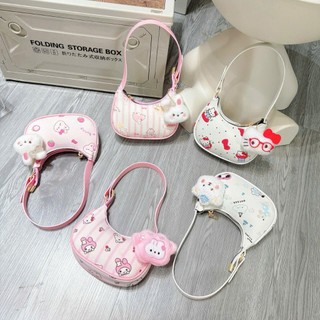 Túi xách mini cho bé gái kẹp nách - cầm tay in hình hoạt hình cute size 14 tặng kèm gấu - TXN021